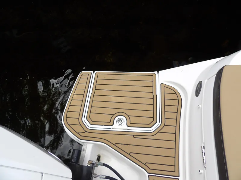Slide: The Image of 2022 Sea Ray SDX 290 Outboard swim platform with teak-style decking. - 15