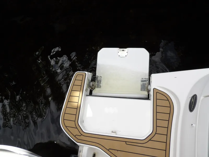 Slide: The Image of 2022 Sea Ray SDX 290 Outboard swim platform with teak-style decking. - 16