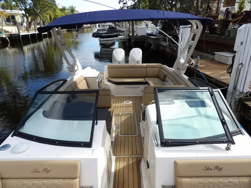 Slide: The Image of 2022 Sea Ray SDX 290 Outboard boat with spacious seating and sleek design. - 24