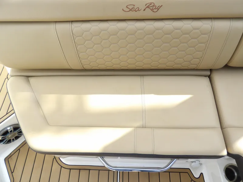 Slide: The Image of 2022 Sea Ray SDX 290 Outboard beige leather seating with hexagonal pattern. - 49
