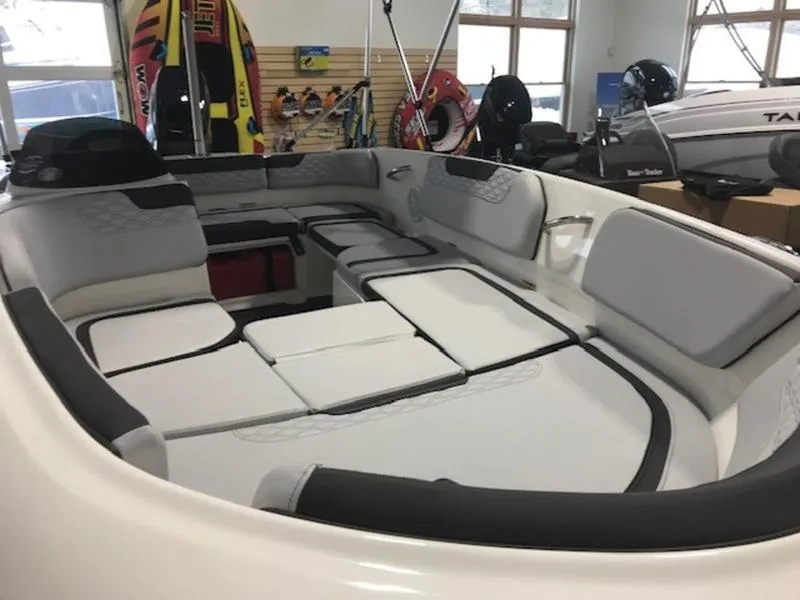 Slide: The Image of 2025 Bayliner M15 boat interior with spacious seating and modern design. - 15