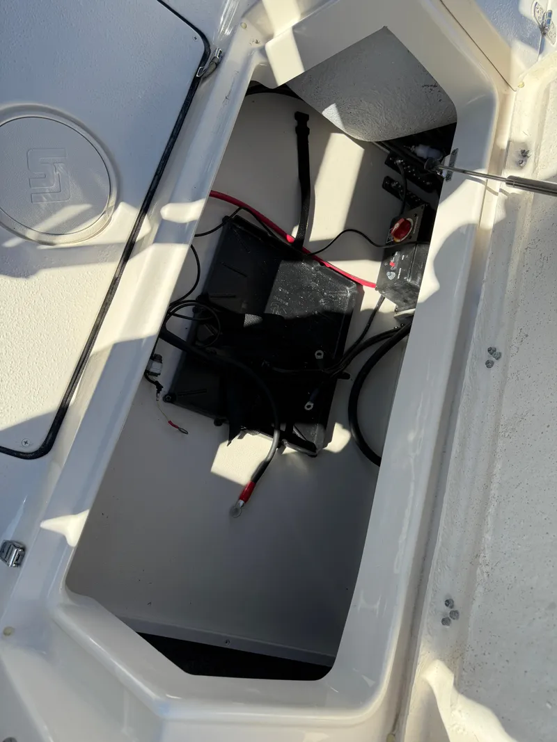 Slide: The Image of 2025 Sea Chaser 22 HFC boat battery compartment with wiring. - 24