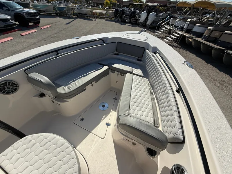 Slide: The Image of 2025 Sea Chaser 22 HFC boat interior with cushioned seating and storage compartments. - 30