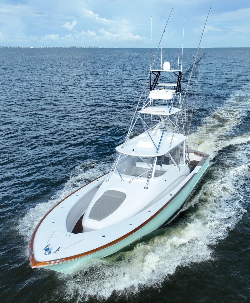 Slide: The Image of 2008 Custom Carolina 45 F&S boat cruising on open water. - 1
