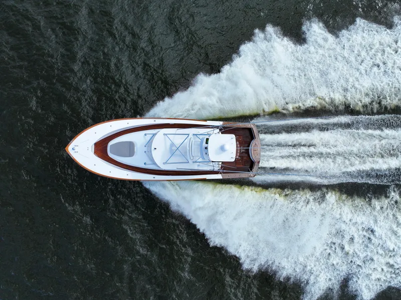 Slide: The Image of Aerial view of 2008 Custom Carolina 45 F&S yacht speeding on water. - 10