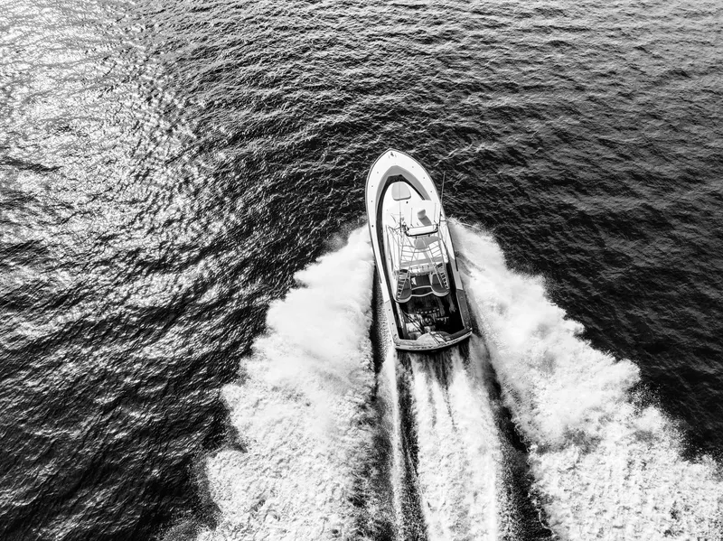 Slide: The Image of Aerial view of 2008 Custom Carolina 45 F&S boat cruising on open water. - 11