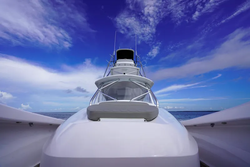 Slide: The Image of Custom Carolina 45 F&S 2008 yacht against a vibrant blue sky and ocean backdrop. - 44