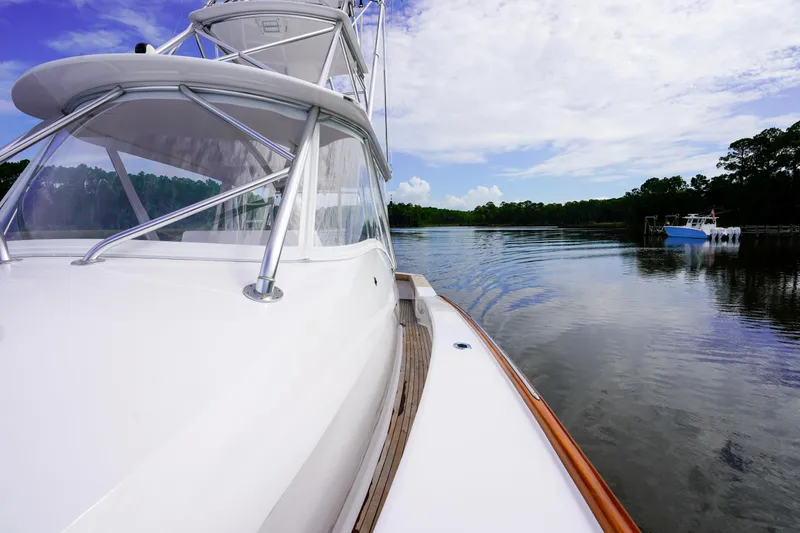 Slide: The Image of Custom Carolina 45 F&S 2008 yacht on calm water, scenic view. - 45