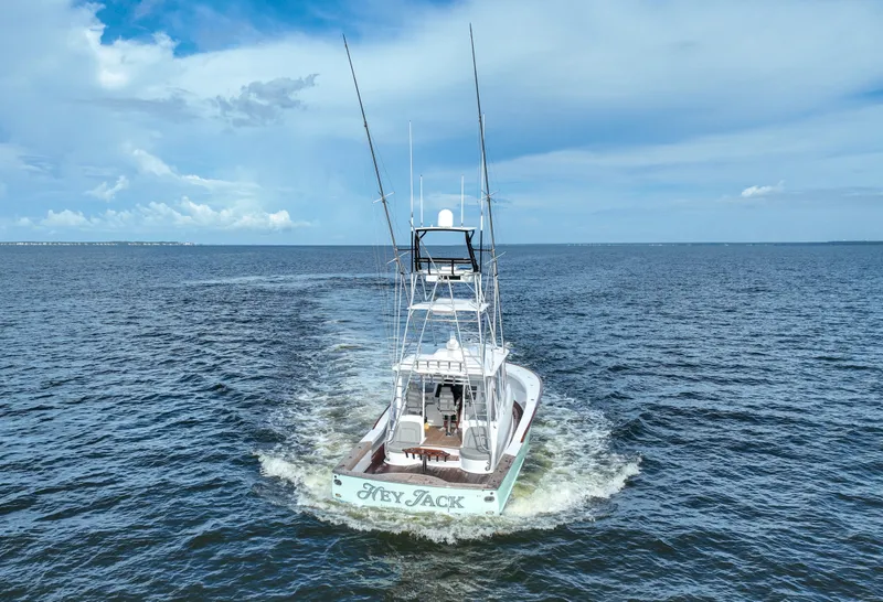 Slide: The Image of Custom Carolina 45 F&S 2008 boat cruising on open water under a clear sky. - 7
