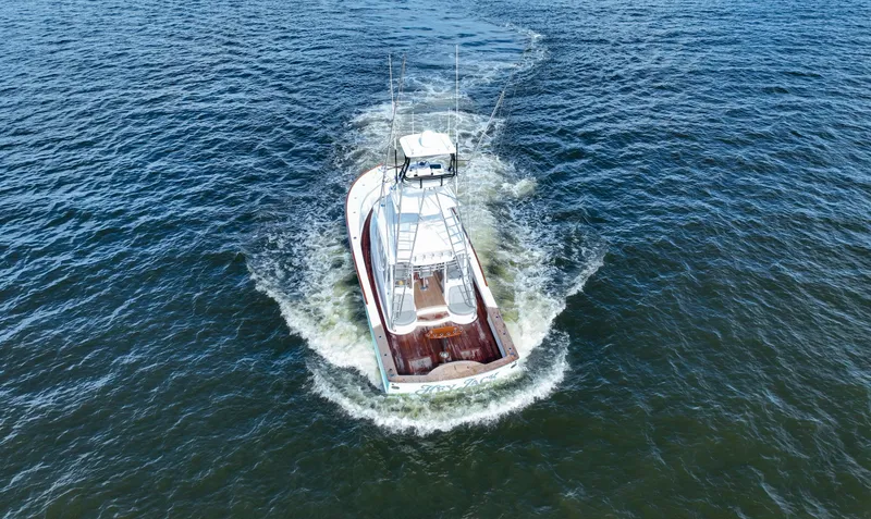 Slide: The Image of Custom Carolina 45 F&S 2008 yacht cruising on open water, aerial view. - 9