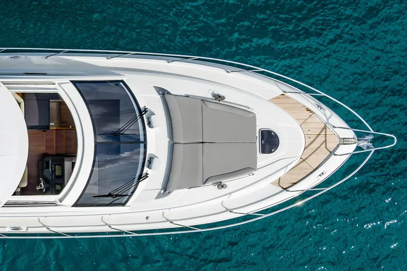 Slide: The Image of Top view of 2017 Beneteau GRAN TURISMO yacht on clear blue water. - 4