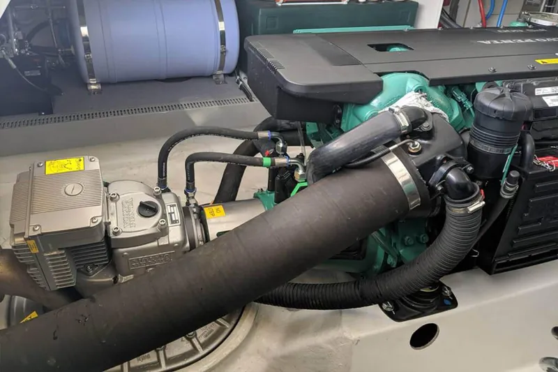 Slide: The Image of Engine compartment of a 2017 Beneteau GRAN TURISMO boat, showcasing mechanical components. - 46