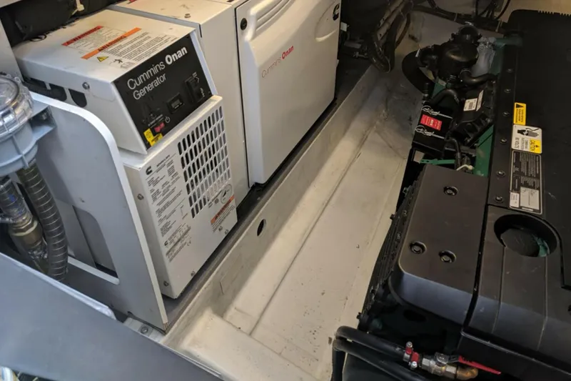 Slide: The Image of Engine room of 2017 Beneteau Gran Turismo with Cummins Onan generator and Volvo Penta engine. - 47