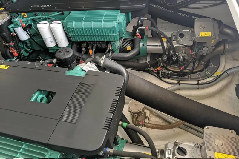 Slide: The Image of Engine compartment of a 2017 Beneteau GRAN TURISMO boat, showcasing mechanical components. - 49