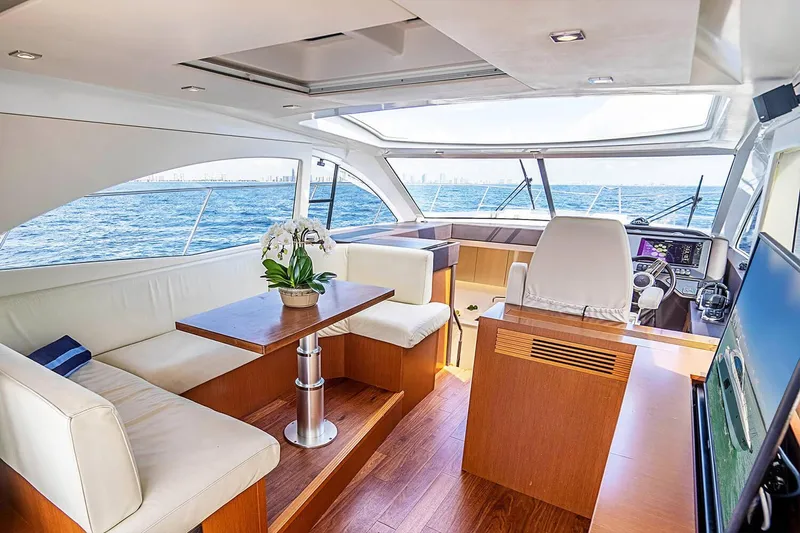 Slide: The Image of Luxurious interior of 2017 Beneteau Gran Turismo yacht with ocean view and elegant seating. - 6