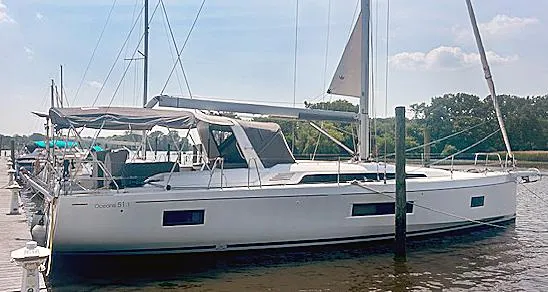 The Image of 2022 Beneteau Oceanis 51.1 sailboat docked on a sunny day. - 0