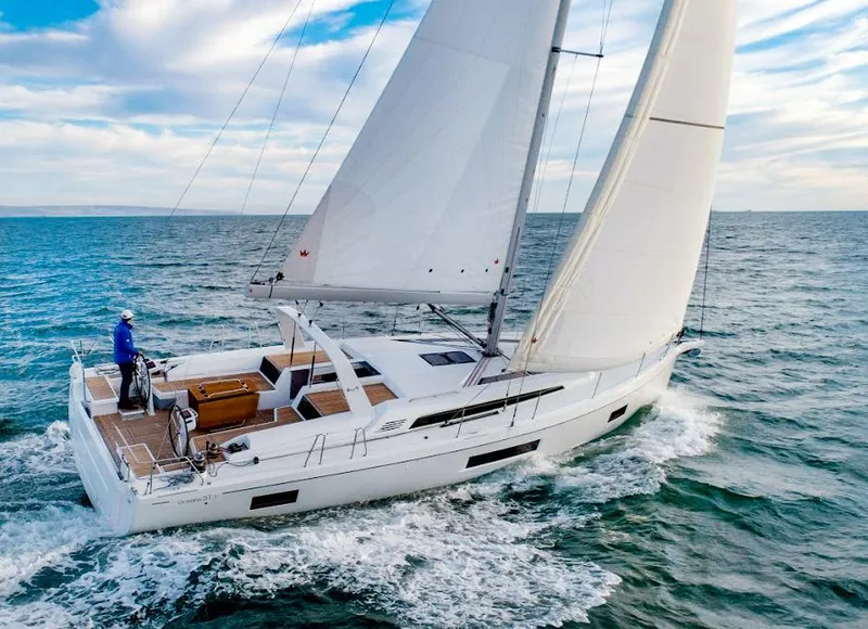 Slide: The Image of Sailing yacht Beneteau Oceanis 51.1, 2022 model, cruising on open sea. - 12