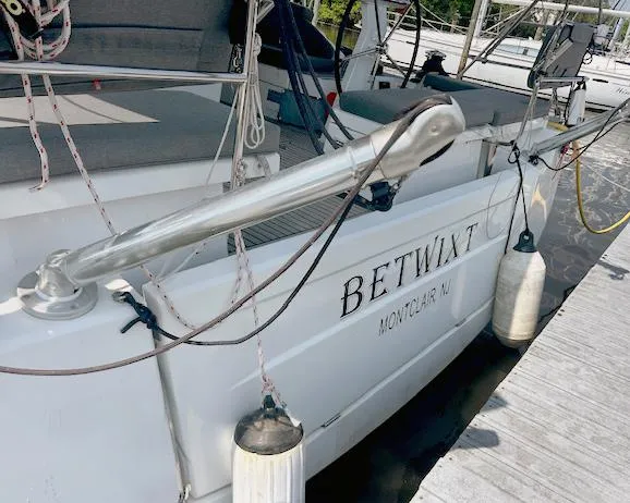 Slide: The Image of Beneteau Oceanis 51.1 yacht docked, featuring "Betwixt" name and Montclair, NJ location. - 5