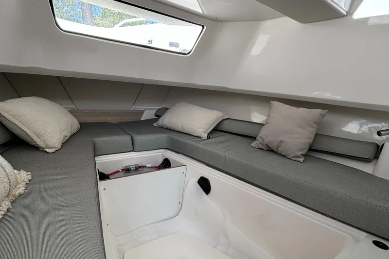 Slide: The Image of Interior of 2025 Zodiac X10CC boat with comfortable seating and cushions. - 20