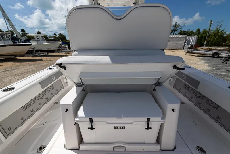 Slide: The Image of 2025 Sea Fox 282 Hybrid LT boat with Yeti cooler storage. - 12