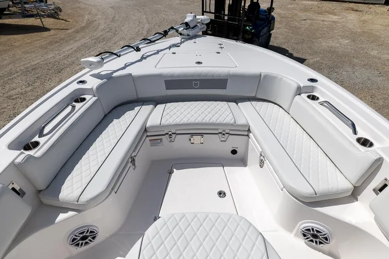 Slide: The Image of 2025 Sea Fox 282 Hybrid LT boat interior with cushioned seating and modern design. - 22