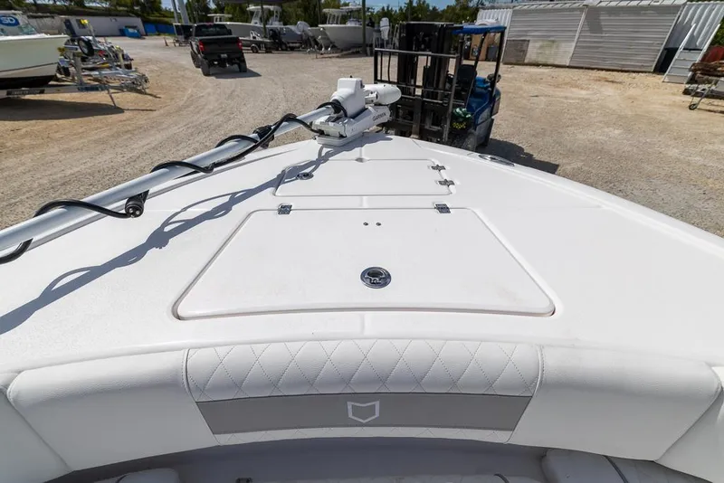 Slide: The Image of 2025 Sea Fox 282 Hybrid LT boat deck with storage compartment and equipment. - 25