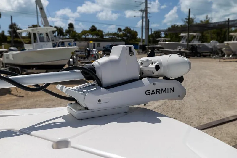 Slide: The Image of Garmin marine equipment on 2025 Sea Fox 282 Hybrid LT boat, docked in a sunny marina. - 26