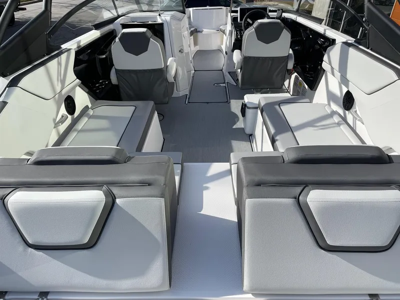 Slide: The Image of 2025 Yamaha Boats AR250 interior with modern seating and sleek design. - 4