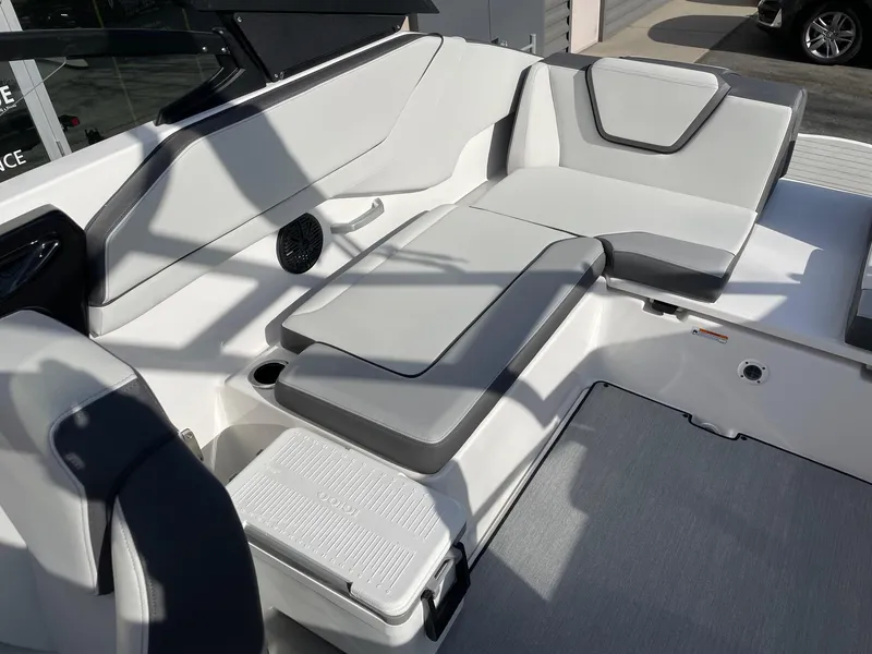Slide: The Image of 2025 Yamaha AR250 boat interior with sleek, modern seating and stylish design. - 7