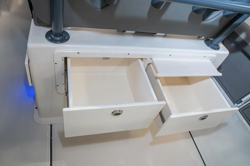 Slide: The Image of 2025 Sea Born LX24 Center Console storage drawers, open and ready for use. - 18