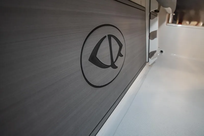 Slide: The Image of 2025 Sea Born LX24 Center Console interior detail with logo. - 26