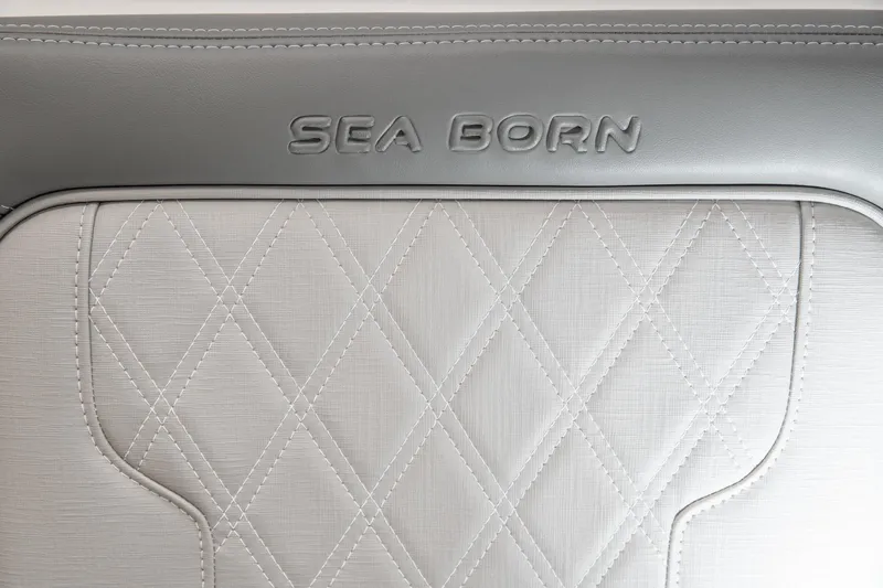 Slide: The Image of 2025 Sea Born LX24 Center Console interior with embossed logo and diamond stitching. - 28