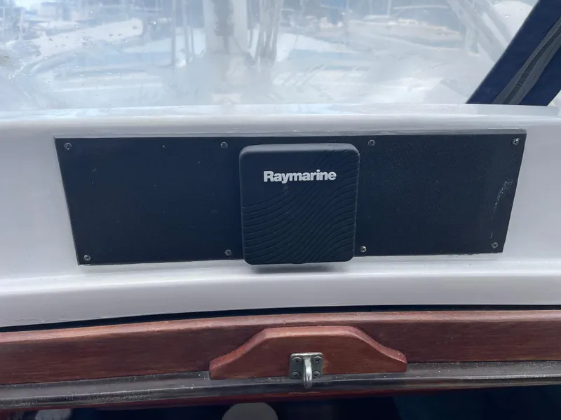 Slide: The Image of Raymarine equipment on 1985 Gulfstar 45 Hirsch Center Cockpit yacht dashboard. - 16
