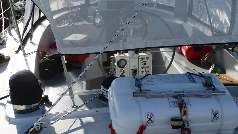 Slide: The Image of 1985 Gulfstar 45 Hirsch Center Cockpit with safety equipment and navigation controls. - 2