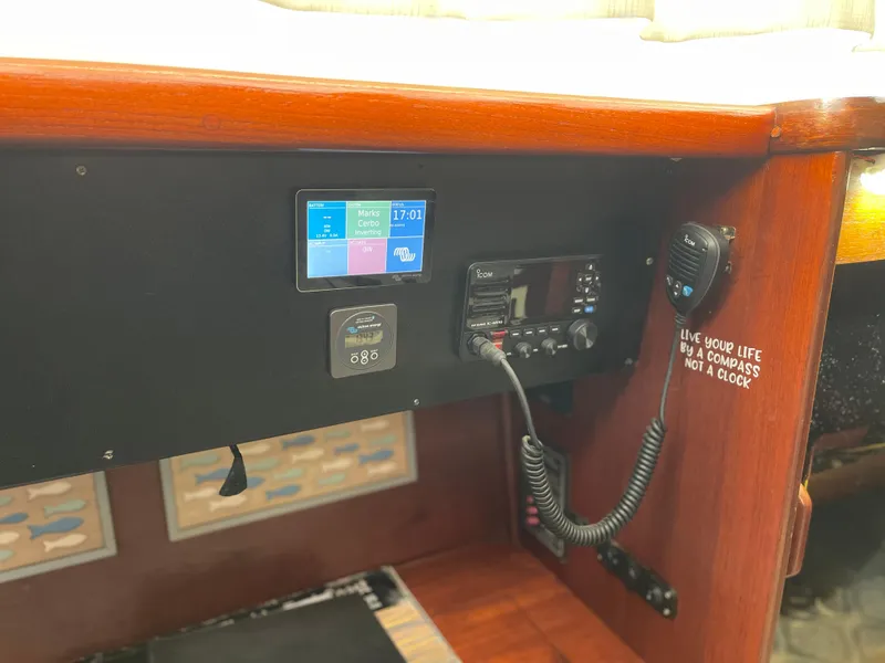 Slide: The Image of Control panel of 1985 Gulfstar 45 Hirsch Center Cockpit with navigation equipment. - 26