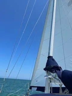 Slide: The Image of Sailing on 1985 Gulfstar 45 Hirsch Center Cockpit under clear blue skies. - 3