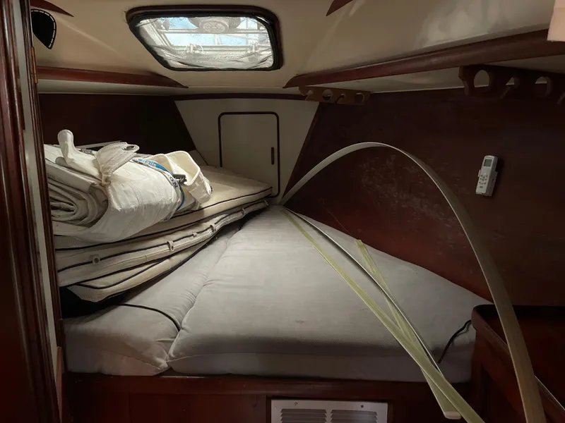 Slide: The Image of Interior cabin of 1985 Gulfstar 45 Hirsch Center Cockpit sailboat with bedding and storage. - 30