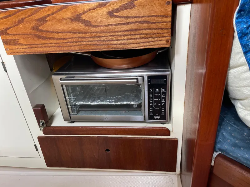 Slide: The Image of Toaster oven in a 1985 Gulfstar 45 Hirsch Center Cockpit yacht kitchen. - 34