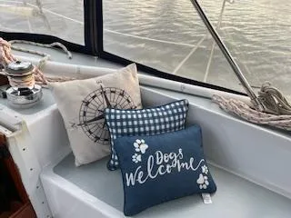 Slide: The Image of Cushions on 1985 Gulfstar 45 Hirsch Center Cockpit, featuring nautical and dog-friendly designs. - 4