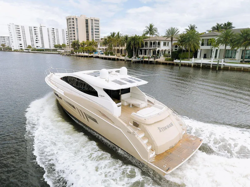 Slide: The Image of Luxurious 2013 Lazzara LSX yacht cruising on a scenic waterway. - 15