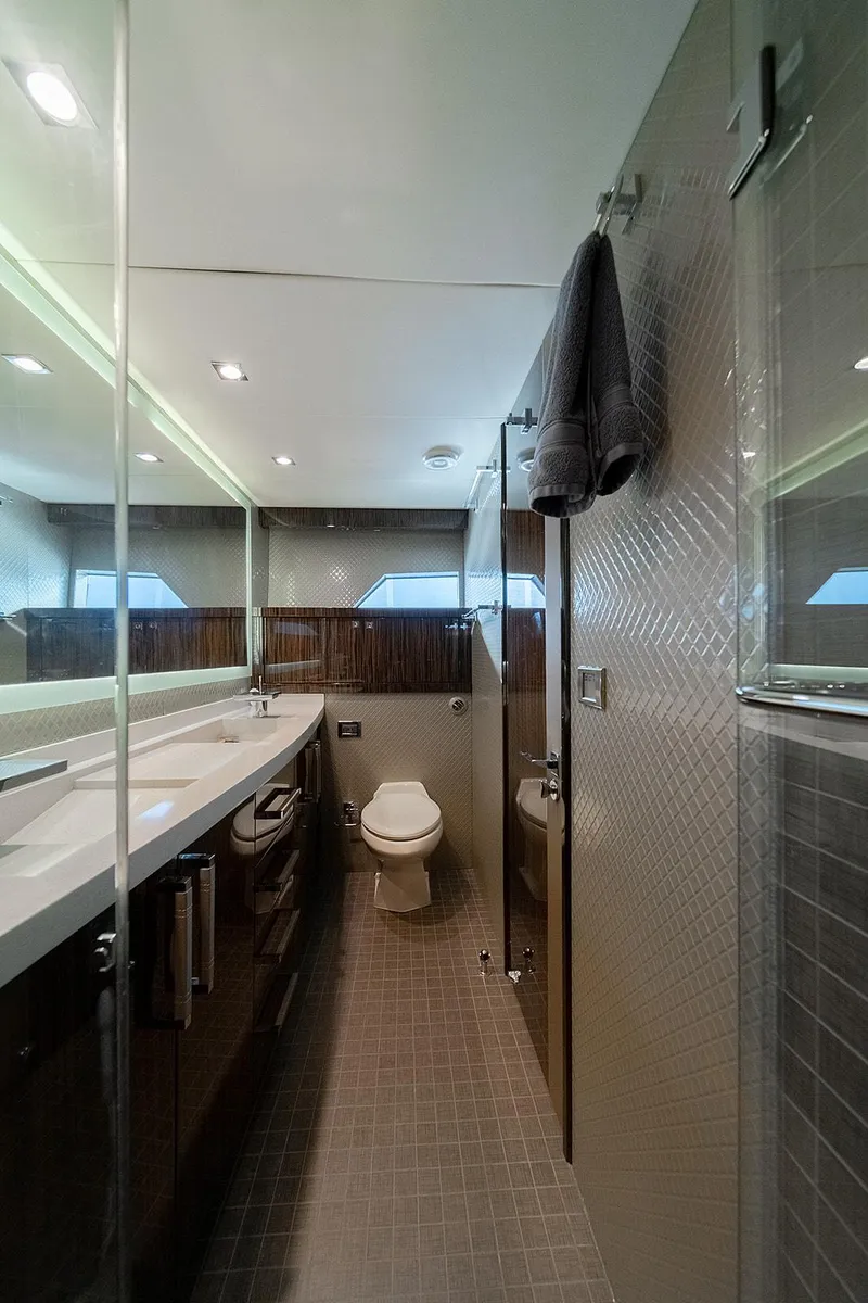 Slide: The Image of Luxurious bathroom in 2013 Lazzara LSX yacht with modern fixtures and elegant design. - 24