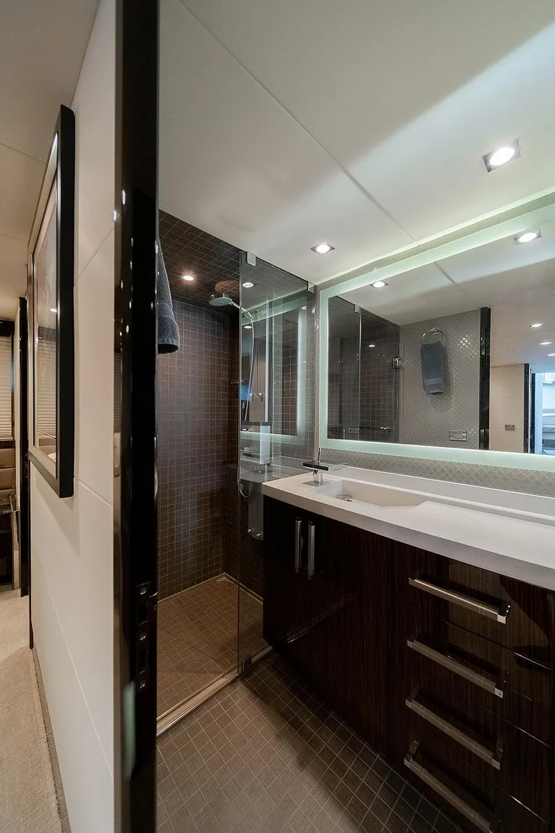 Slide: The Image of Luxurious bathroom interior of 2013 Lazzara LSX yacht with modern fixtures and elegant design. - 25