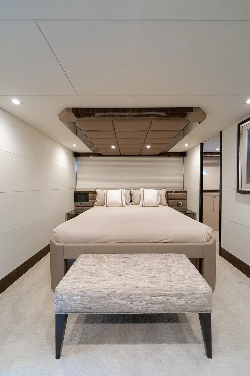 Slide: The Image of Luxurious bedroom interior of 2013 Lazzara LSX yacht with modern design and elegant furnishings. - 29