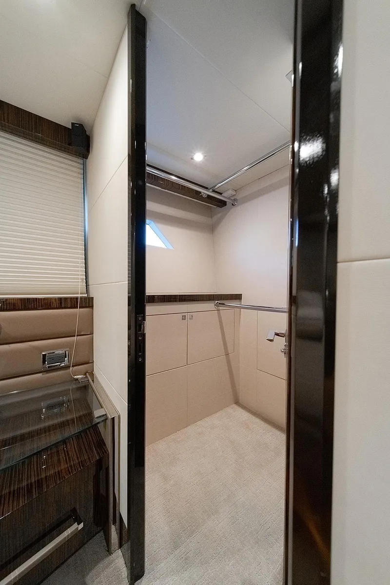 Slide: The Image of 2013 Lazzara LSX yacht interior with modern bathroom design and sleek finishes. - 30