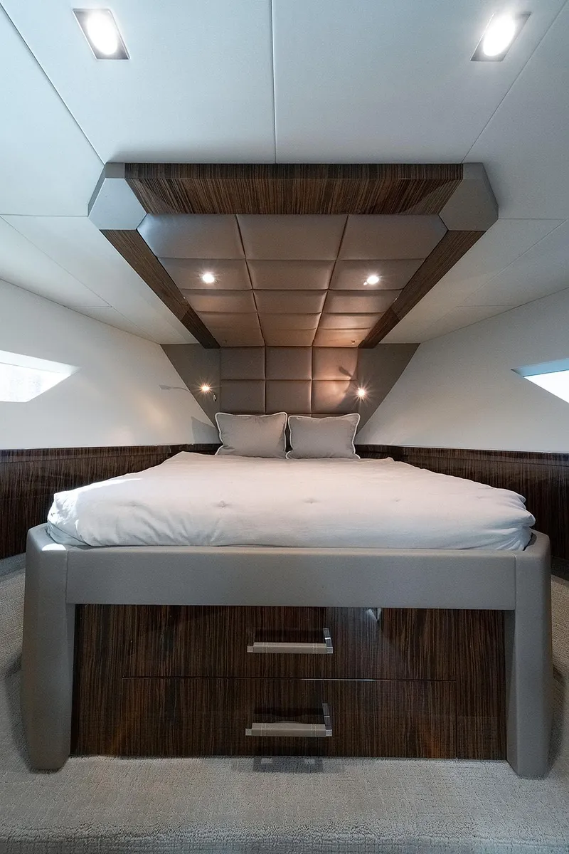 Slide: The Image of Luxurious 2013 Lazzara LSX yacht bedroom with modern design and elegant lighting. - 32