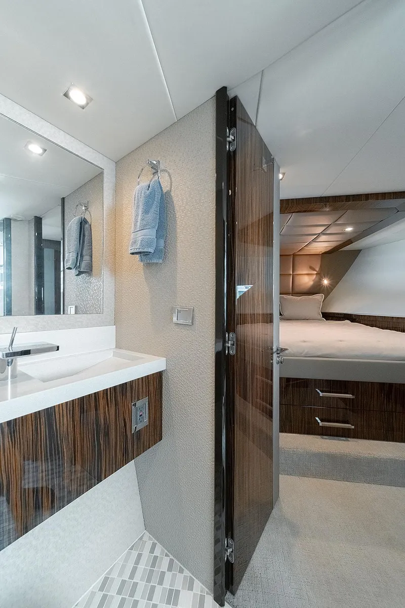 Slide: The Image of Luxurious 2013 Lazzara LSX yacht interior with modern bathroom and cozy bedroom. - 37