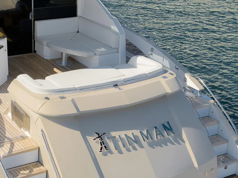Slide: The Image of Luxury 2013 Lazzara LSX yacht deck with seating, overlooking calm waters. - 7