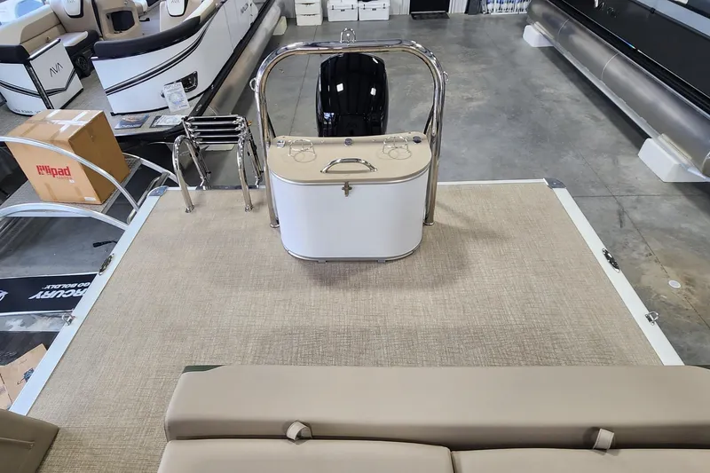 Slide: The Image of 2025 Avalon Platinum LSZ 2185 Cruise Rear Bench interior with helm and seating. - 10