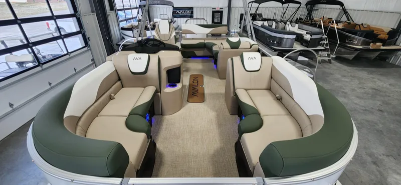 Slide: The Image of 2025 Avalon Platinum LSZ 2185 Cruise Rear Bench in showroom, featuring luxurious seating and modern design. - 3