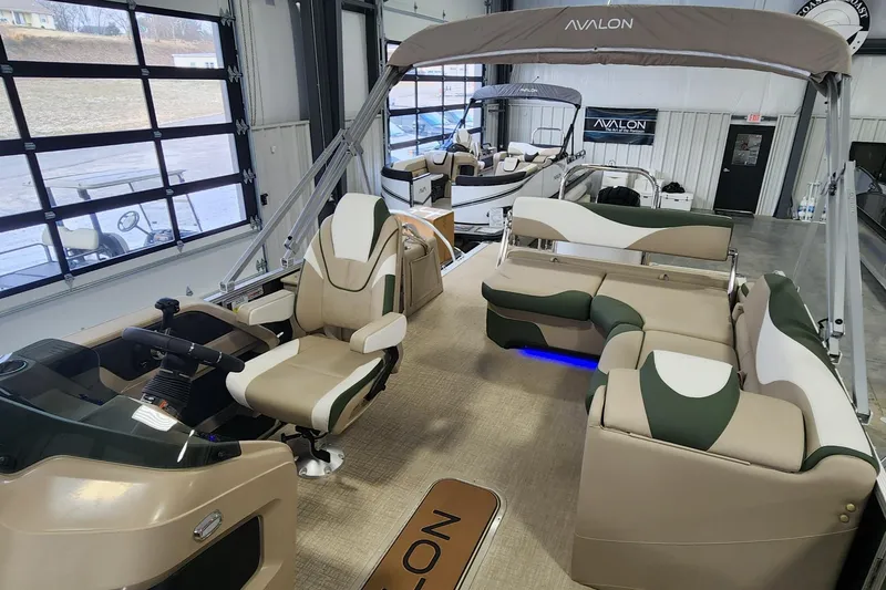Slide: The Image of 2025 Avalon Platinum LSZ 2185 Cruise Rear Bench pontoon boat, luxurious interior, modern design. - 4